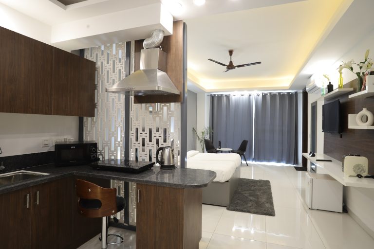 A well furnished accommodation room featuring space to sleep and cook