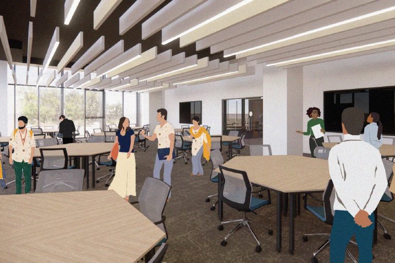 An airy and light learning space with modular tables laid out for a class